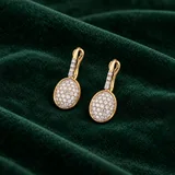 Nanis Ciliegine Baby Earrings on emerald suede