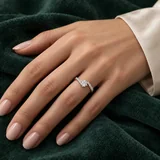 Anniversary Solitaire worn on the ring finger